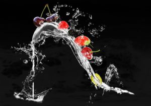 The picture of a flow of fresh water loaded with appetizing looking fruits.