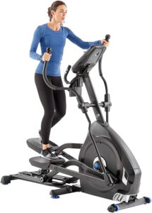 The great picture of a woman utiling here Nautilus E616 Elliptical Trainer.